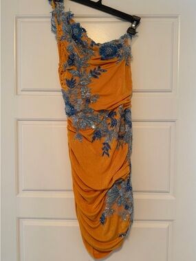 One-Shoulder Embroidered Draped Dress in Mustard with Blue Appliqué